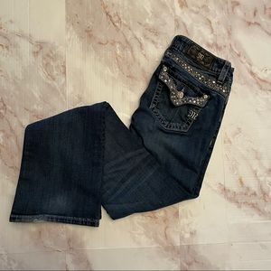 Miss Me mid-rise boot cut jeans in size 27